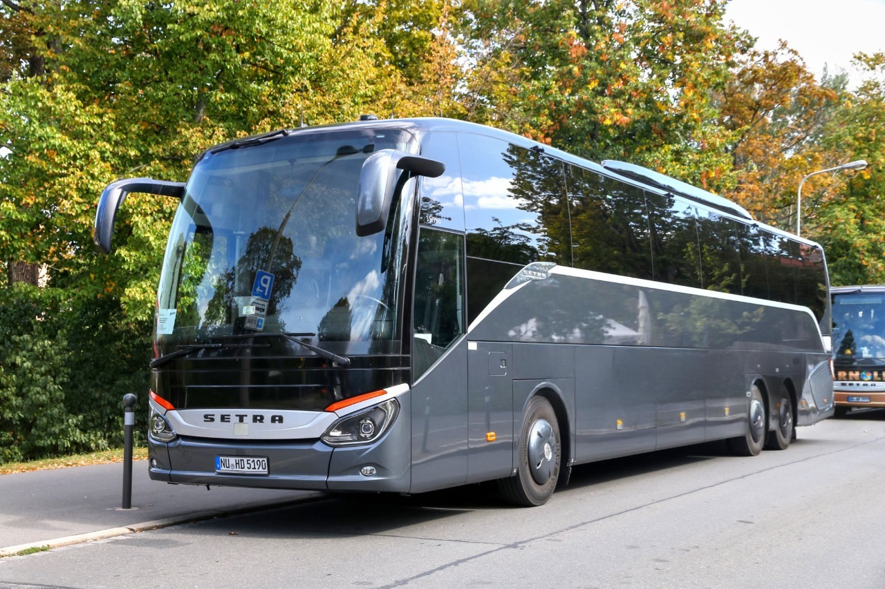 Luxurious black coach interior, ideal for VIP corporate travel or weddings in Scotland.