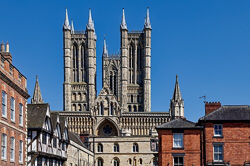 White long wheelbase van on a road in Lincoln, UK, suitable for house removals.